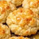 This classic vanilla pound cake is a timeless treat known for its rich, buttery flavor and tender crumb